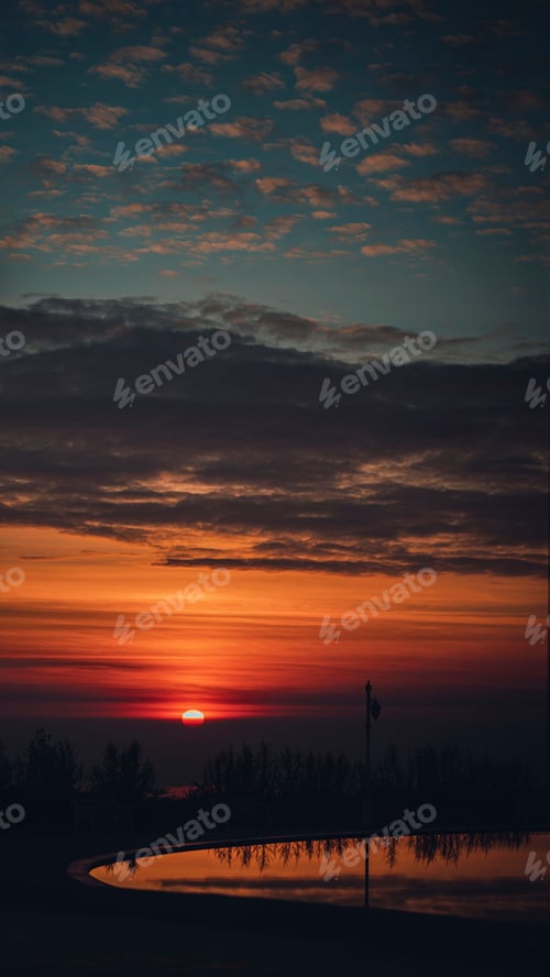 Preview: a beautiful sunset in the sky over a landscape in Kurdistan