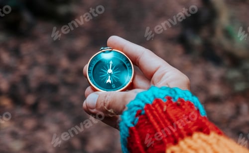 Preview: Eyes point of view pov of woman hand holding and using a magnetic old compass