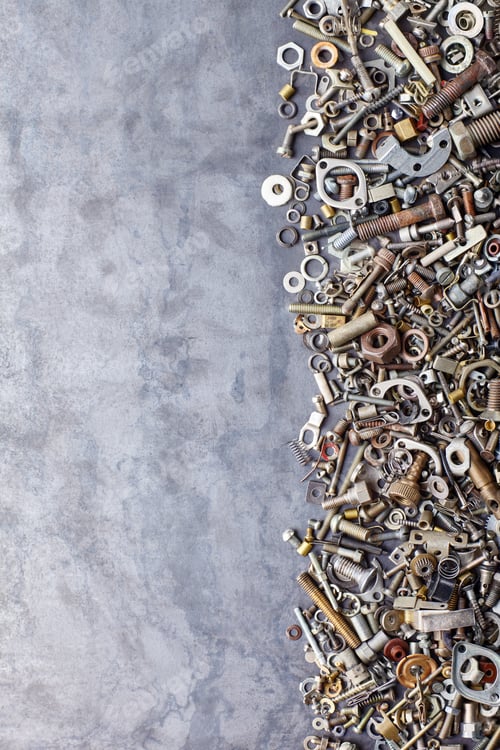 Preview: Assorted nuts and bolts on metal texture background