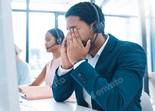 Preview: Stress, customer support and call center employee with a headache in a workplace with headset. Cust