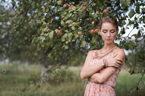 Preview: girl in the apple orchard.