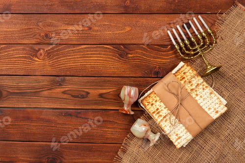 Preview: Jewish holiday Passover banner design with wine, matzo on wooden background.