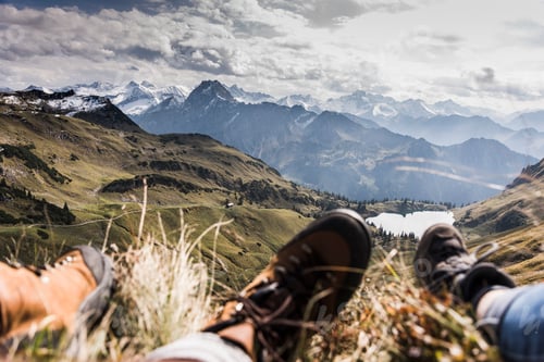 Preview: Germany, Bavaria, Oberstdorf, feet of two hikers resting in alpine scenery