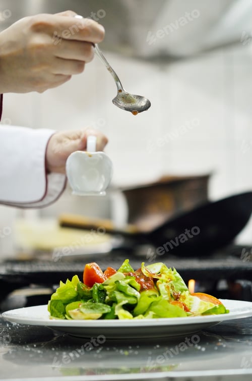 Preview: Beautiful Young Chef Woman Prepare And Decorating Tasty Food In Kitchen