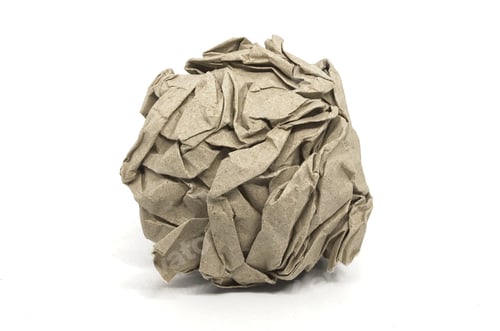 Preview: Crumpled piece of recycled paper isolated on white background - green waste concept