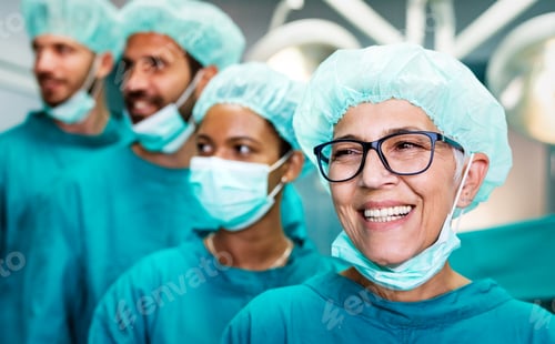 Preview: Smiling Medical Team in Hospital Wearing Surgical Garb
