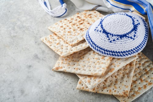 Preview: Passover celebration concept. Matzah, red kosher and walnut. Traditional ritual Jewish bread matzah,