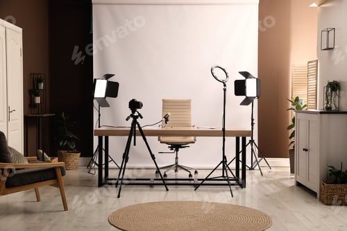 Preview: Modern blogger's workplace with professional equipment in room