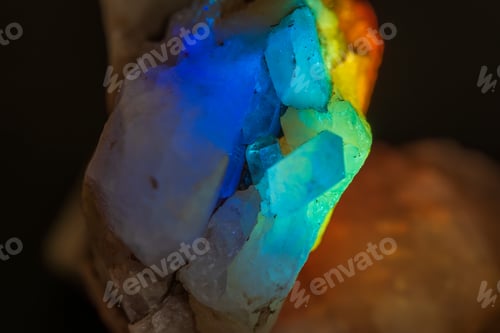 Preview: natural quarts rock with embedded crystal in turquoise light