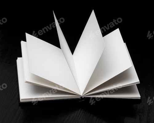Preview: Open book on black background