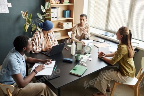 Preview: Adult Man Conversing with English Course Students in Speaking Club Indoors