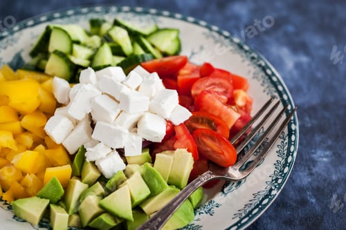 Preview: Delicious tomato, bell pepper, cucumber, avocado, onion and feta