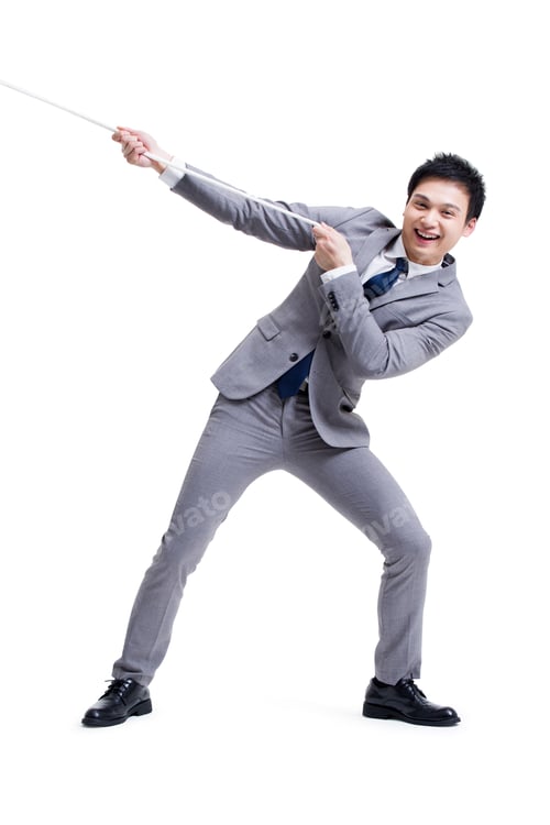 Preview: Excited businessman pulling rope