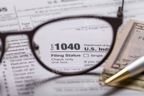 Preview: Income tax with instruction, money and glasses. Tax payment and filing concept