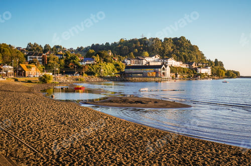 Preview: Beautiful lakefront view of Puerto Varas, Chile, at golden hour.
