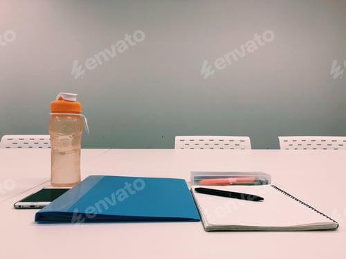 Preview: Meeting preparation. Drink, folder, notebook, pens, stationery. Conference.
