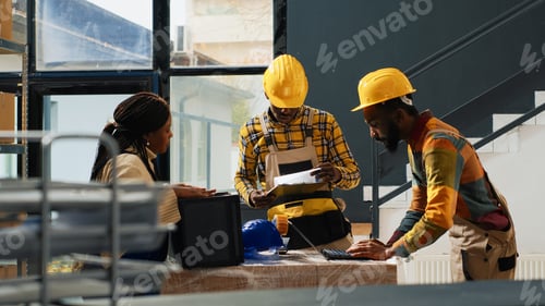 Preview: Team of employees using laptop to do inventory