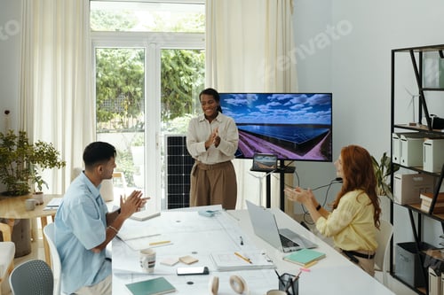 Preview: Engineers Clapping After Successful Presentation