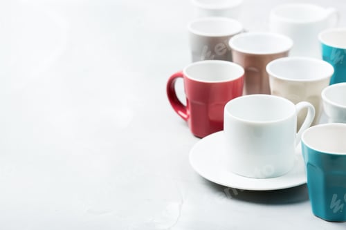 Preview: Different empty tea and coffee mugs and cups for breakfast