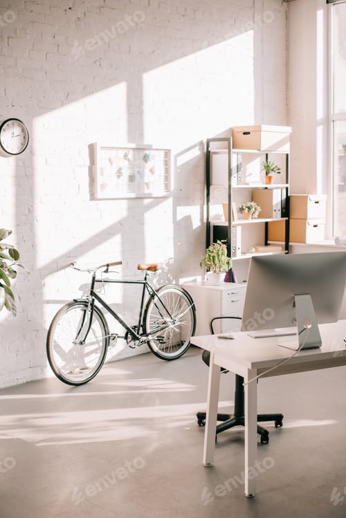 Preview: modern office design with flip chart, bicycle and computer desk