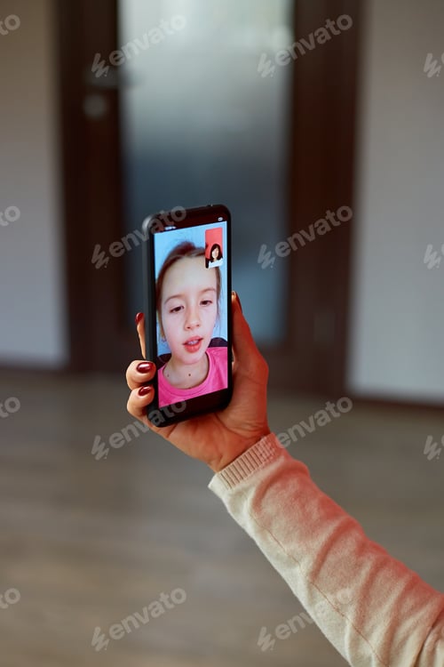 Preview: Child Video Calling with Friend Using Mobile Phone
