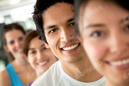 Preview: Group Of People At The Gym In A Row And Smiling