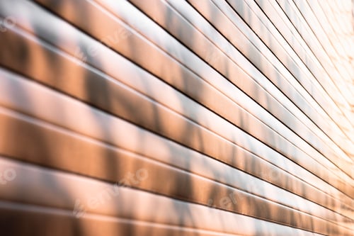 Preview: Abstract background with horizontal stripes in the building wall with shadow.