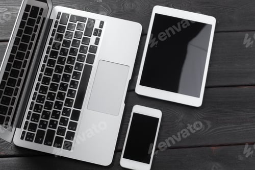 Preview: Open laptop with digital tablet and smartphone close up