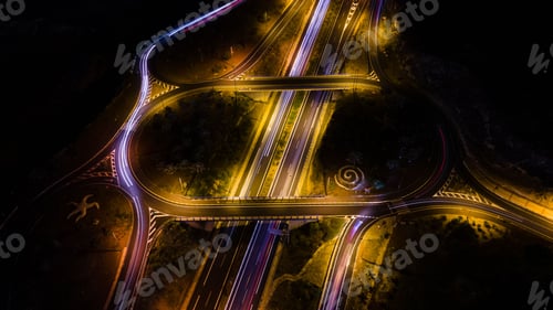 Preview: multiple different traffic lanes running in the city at night overcast