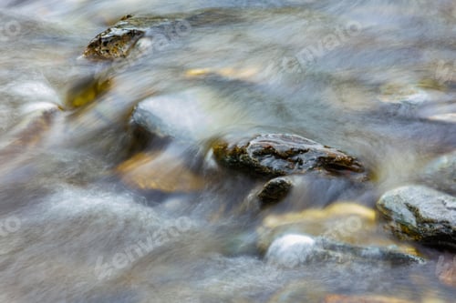 Preview: long exposure of a River stream on mountain valley.