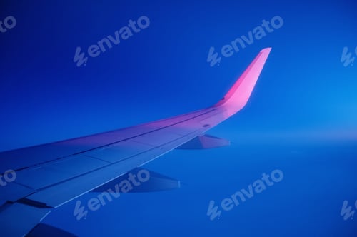 Preview: Aircraft wing and sky. Air transport.