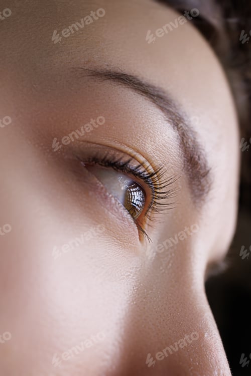 Preview: Close-up of the model's eyes side view of permanent makeup eyelashes. PMU eyelashes