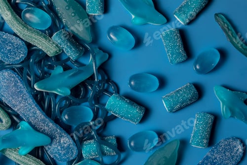 Preview: Top view of various blue jellies on a bright blue background