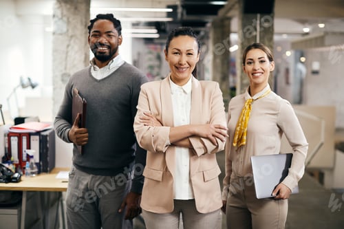 Preview: Portrait of happy multi-ethnic business team at corporate office.