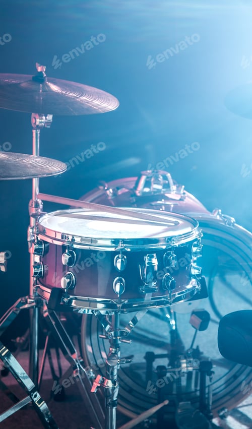 Preview: musical instruments drum kit, flash of light, a beautiful light in the background with copy space
