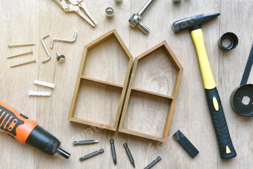 Preview: House building and maintenance, DIY and construction tools on wooden background.