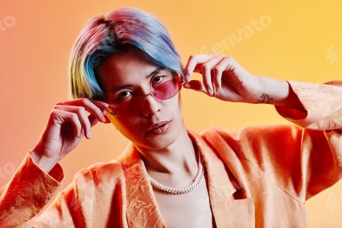 Preview: Young stylish guy in pink glasses