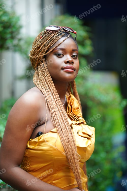 Preview: Portrait of young Afro girl with dead lock hairstyle smile at camera.