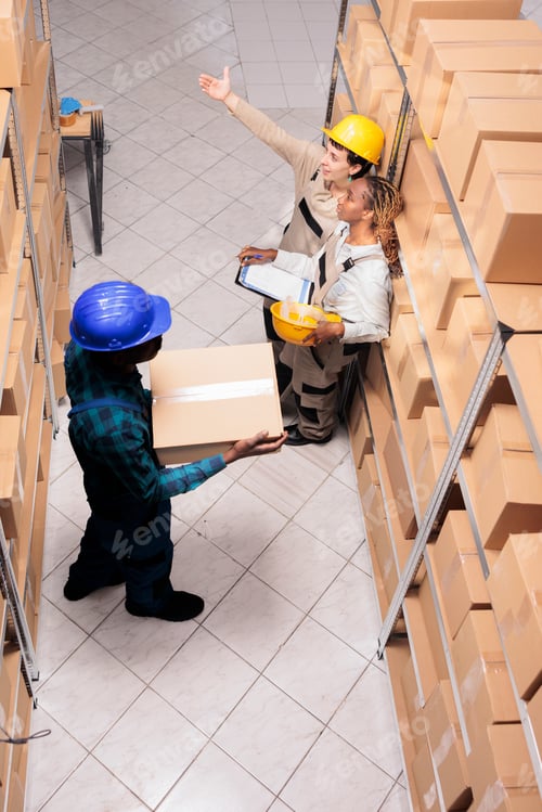 Preview: Storehouse employees managing retail stock supply with goods checklist