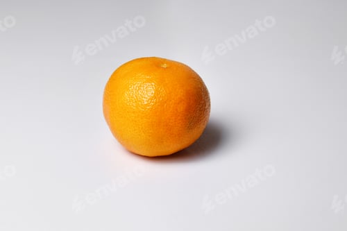 Preview: tangerine or clementine isolated on white background. Mandarin, tangerine citrus fruit on gray backg