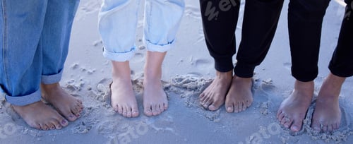Preview: Beach feet, friends and people on vacation, holiday or summer trip. Toes, freedom and group of men
