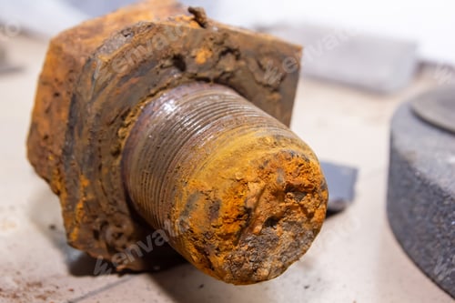 Preview: Closeup shot of a rusty old industrial screw nut and bolt