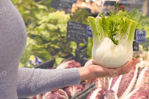 Preview: Female Hand Choosing Fennel In The Store