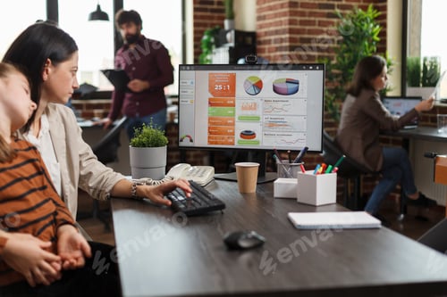 Preview: Business woman analyzing economic growth of company and reviews financial and management chart