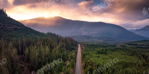 Preview: Scenic Road in Vancouver Island, BC, Canada. Aerial View with mountains and fog