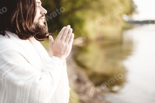 Preview: Jesus Christ praying while his eyes are closed