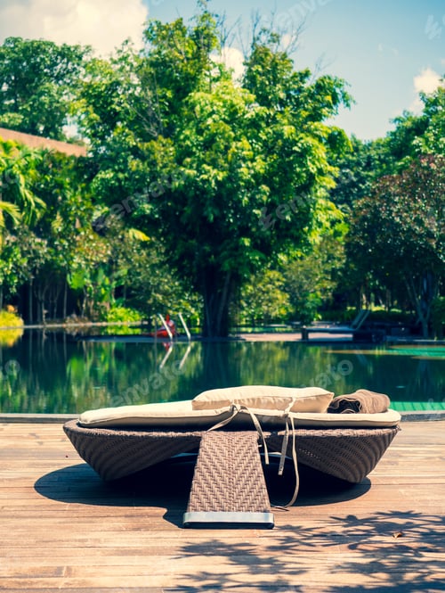 Preview: luxury swimming pool at tropical hotel resort