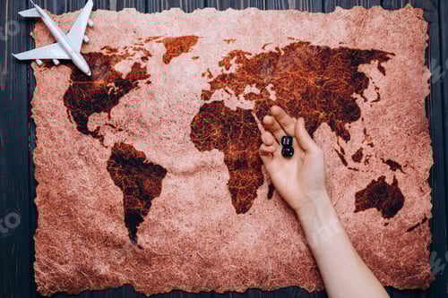 Preview: The white toy plane on the world map and dice