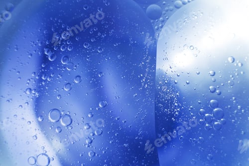 Preview: Oil bubbles close up. circles of water macro. abstract light blue background
