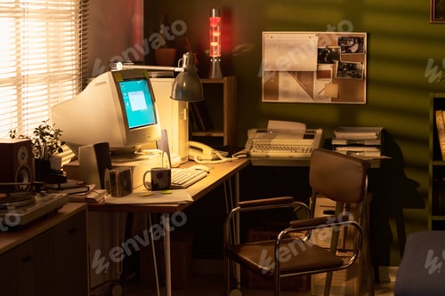 Preview: Vintage Desktop Computer and Office Equipment Illuminating Retro Home Workspace